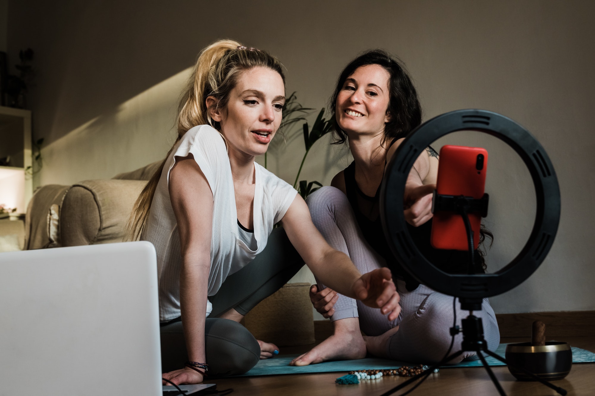 Blogger yoga teacher women streaming online meditation class at home - Healthy lifestyle